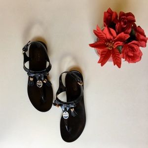 COACH jelly black sandals with gold accents